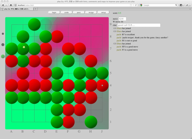 Ein Computerbildschirm zeigt ein Go-Spiel mit roten und grünen Kreisen in einem Gittermuster.