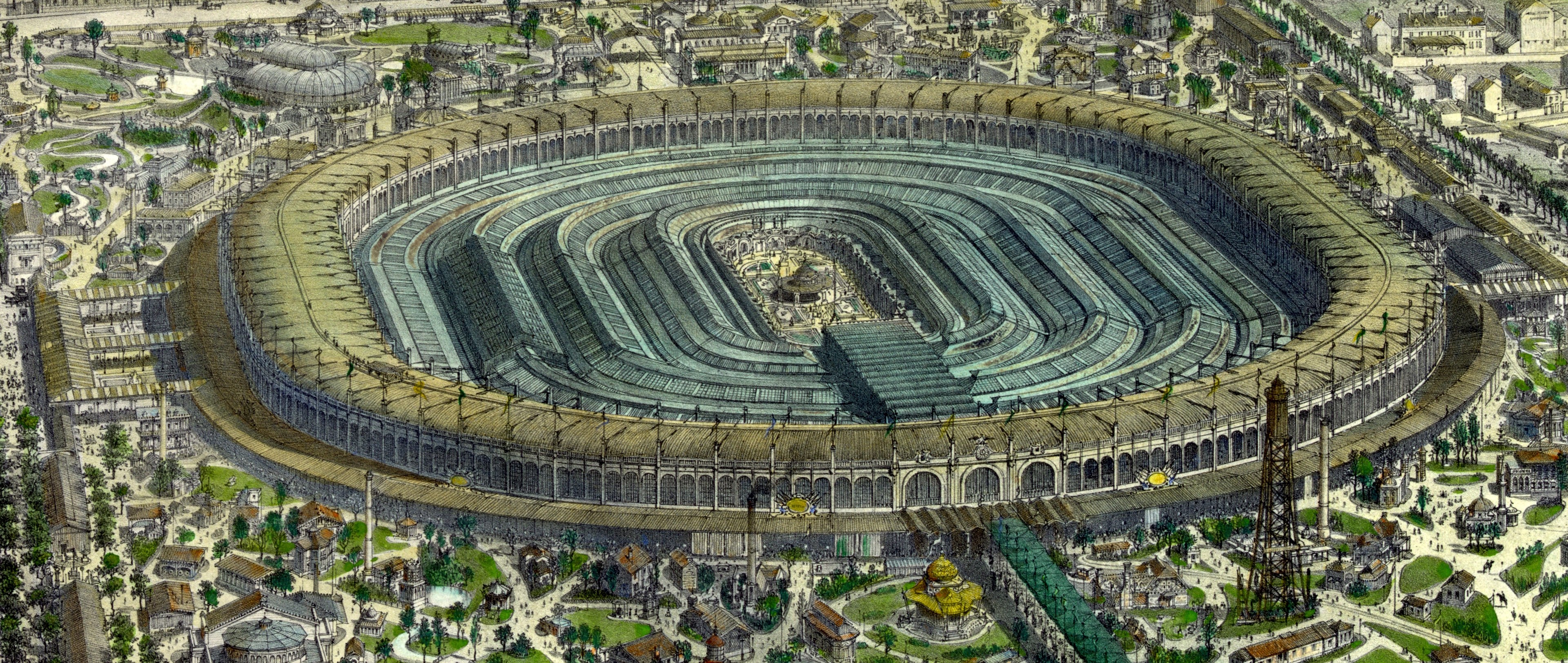 Luftaufnahme eines großen Stadions, umgeben von Gebäuden, Bäumen und Gras in einer städtischen Umgebung.