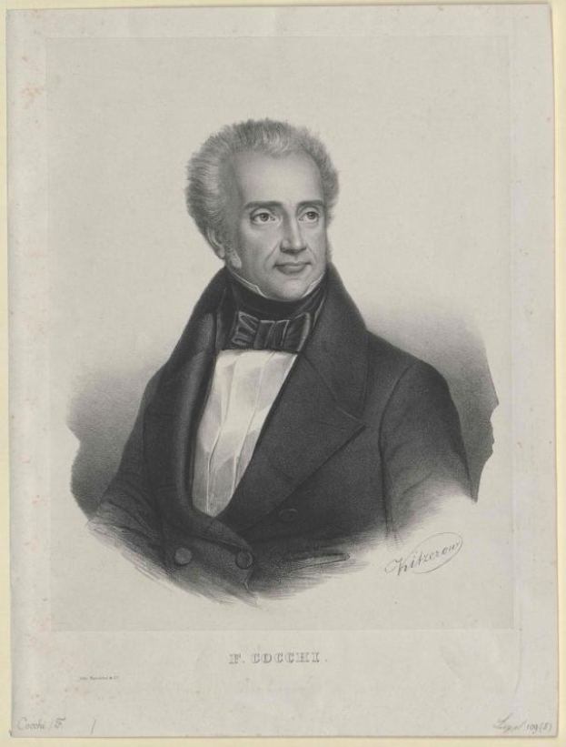 Schwarzes und weißes Porträt von F. Cocchi, dem Komponisten der Oper, in einem Smoking mit ernstem Gesichtsausdruck, betitelt mit "Die Musik der Oper" unten.
