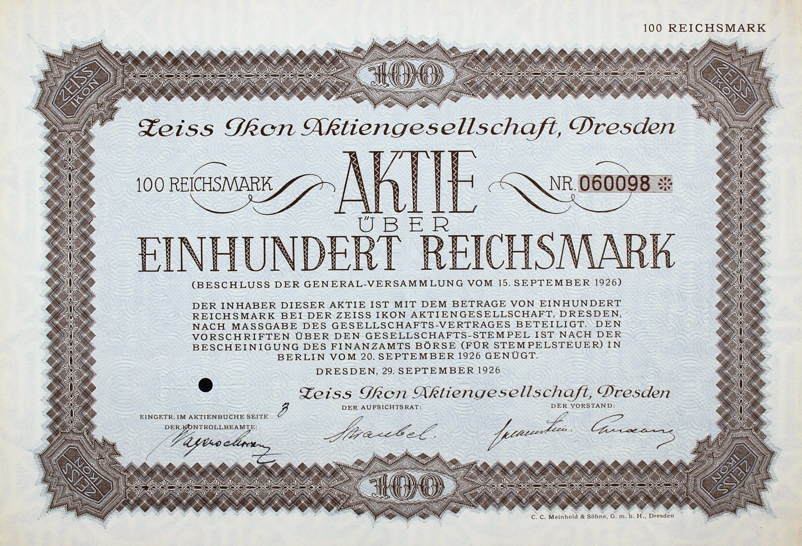 Altes deutsches Aktienzertifikat über einhundert Reichsmark mit schwarzem Rand und gedrucktem Text.