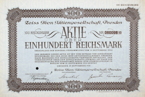 Altes deutsches Aktienzertifikat über einhundert Reichsmark mit schwarzem Rand und gedrucktem Text.